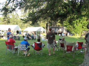 Afternoon picnic in the park with music